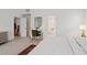 Comfortable main bedroom with plush carpet, vanity, and convenient ensuite access at 1211 Gloriosa St, Apex, NC 27523