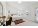 Light-filled main bedroom with plush carpet, vanity, and ample natural light at 1211 Gloriosa St, Apex, NC 27523