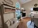 A cozy dining room with ample natural light with fireplace and decorative accents create an inviting atmosphere at 1312 High Ridge Dr, Mebane, NC 27302