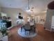 The dining room is bright and open with a fireplace and ample space for gathering with Gathering and friends at 1312 High Ridge Dr, Mebane, NC 27302