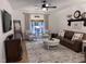 Cozy living room with hardwood floors, stylish furniture, and a decorative rug at 1312 High Ridge Dr, Mebane, NC 27302