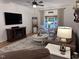 Comfortable living room featuring stylish furniture and a large area rug at 1312 High Ridge Dr, Mebane, NC 27302