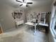 Spacious home office with neutral carpet, ample storage, and a ceiling fan at 1312 High Ridge Dr, Mebane, NC 27302