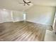 Open concept living room with wood-look floors at 138 Sourgum Ct, Zebulon, NC 27597