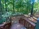 Backyard and patio are surrounded by beautiful scenery and greenery at 14 Striding Ridge Ct, Durham, NC 27713