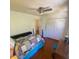 Bedroom with ceiling fan, a double bed with a colorful quilt, and lots of closet space at 14 Striding Ridge Ct, Durham, NC 27713