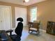 Cozy bedroom with neutral walls, carpet, and a window, offering a serene space at 14 Striding Ridge Ct, Durham, NC 27713