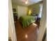 Bedroom with a green accent wall, closet and hardwood floors at 14 Striding Ridge Ct, Durham, NC 27713