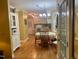 Charming dining room open to the kitchen, featuring hardwood floors and ample natural light at 14 Striding Ridge Ct, Durham, NC 27713