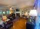 Bright living room showcasing hardwood floors, a fireplace, and comfortable seating at 14 Striding Ridge Ct, Durham, NC 27713