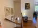 Entryway staircase with natural lighting, art pieces adorning the wall at 14 Striding Ridge Ct, Durham, NC 27713