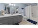 Bathroom featuring a vanity, toilet and shower/tub combination at 148 Shadowbrook Dr, Henderson, NC 27537