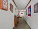 Hallway featuring wall decorations and carpet floor at 148 Shadowbrook Dr, Henderson, NC 27537