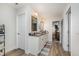Bright bathroom features a double sink vanity, framed mirrors, and neutral wall color at 152 Briar Den Ct, Benson, NC 27504