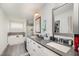 Stylish main bathroom featuring dual sinks, a soaking tub, and a walk-in shower at 152 Briar Den Ct, Benson, NC 27504
