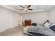 This spacious bedroom features neutral carpet and a large dresser for ample storage at 152 Briar Den Ct, Benson, NC 27504