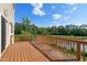 Large, private deck overlooking a beautiful wooded area and pond at 1600 Tinos Overlook Way, Apex, NC 27502
