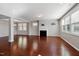 Spacious living room with hardwood floors, a fireplace, and plenty of natural light at 1600 Tinos Overlook Way, Apex, NC 27502