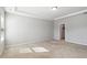 Spacious main bedroom featuring neutral walls, carpet, and a tray ceiling at 1600 Tinos Overlook Way, Apex, NC 27502