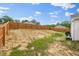 Spacious fenced backyard with privacy and potential for outdoor activities at 165 Bywood Dr, Roxboro, NC 27573