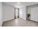 A bedroom featuring a window and two entryways at 165 Bywood Dr, Roxboro, NC 27573