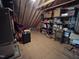 Spacious attic, featuring shelving, lighting, and storage potential at 1655 Kingfisher Ct, Nashville, NC 27856