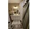 Well-maintained bathroom featuring a vanity with storage and a neutral color scheme at 1655 Kingfisher Ct, Nashville, NC 27856