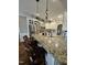 Kitchen features granite countertops, stainless appliances, and a breakfast bar with seating at 1655 Kingfisher Ct, Nashville, NC 27856