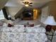 Open living room features a TV, ceiling fan, and access to another room at 1655 Kingfisher Ct, Nashville, NC 27856