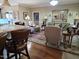 Spacious living room features hardwood floors, a fireplace, and plenty of natural light at 1655 Kingfisher Ct, Nashville, NC 27856