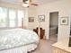 Bedroom with a four poster bed and en suite bathroom view at 1707 Falls Church Rd, Raleigh, NC 27609