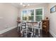 Charming breakfast nook with a farmhouse-style table and plenty of natural light at 175 Lockamy Ln, Youngsville, NC 27596