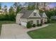 Beautiful home with a well-manicured lawn and a spacious driveway at 175 Lockamy Ln, Youngsville, NC 27596