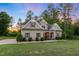 Attractive two-story home featuring a well-kept lawn and landscaped front yard at 175 Lockamy Ln, Youngsville, NC 27596