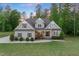 Beautiful exterior of a two-story home with well-maintained landscaping and a lovely front entrance at 175 Lockamy Ln, Youngsville, NC 27596
