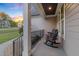 Relaxing front porch with rocking chairs and view of the manicured front lawn at 175 Lockamy Ln, Youngsville, NC 27596