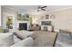Cozy living room featuring a fireplace, an entertainment center, and comfortable seating at 175 Lockamy Ln, Youngsville, NC 27596