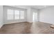 Inviting living area offers lots of natural light, luxury floors, and access to a private outdoor space at 1907 Hinesley Dr, Durham, NC 27703