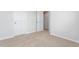Carpeted bedroom with ensuite bathroom access at 1907 Hinesley Dr, Durham, NC 27703