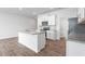 A kitchen featuring white cabinets, granite countertops, stainless steel appliances and island at 1913 Hinesley Dr, Durham, NC 27703