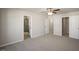 Spacious bedroom with carpet, ensuite bath, and walk-in closet at 1915 Hinesley Dr, Durham, NC 27703
