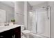 Bathroom featuring a glass-enclosed shower, modern vanity, and neutral color scheme at 200 Chateau Way, Angier, NC 27501
