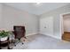 Bedroom featuring carpeted floors, a desk with a chair and large closet space at 200 Chateau Way, Angier, NC 27501