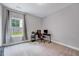 Bedroom featuring a window and a desk with a chair for a simple home office space at 200 Chateau Way, Angier, NC 27501