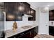 Kitchen featuring granite countertops, stainless steel appliances and ample cabinet space at 200 Chateau Way, Angier, NC 27501