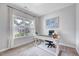 Cozy office space featuring a large window with curtains, a desk, and decorative accents at 200 Chateau Way, Angier, NC 27501
