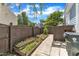 A backyard featuring raised garden beds and a walkway at 2006 Keokuk Ct, Apex, NC 27523
