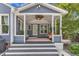 Exterior view of cozy covered patio with seating at 2006 Keokuk Ct, Apex, NC 27523