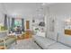 Bright open living space with hardwood floors, view to the kitchen and dining area at 2006 Keokuk Ct, Apex, NC 27523