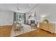 Bright and airy living room with hardwood floors, vaulted ceiling, and stylish furniture at 2006 Keokuk Ct, Apex, NC 27523